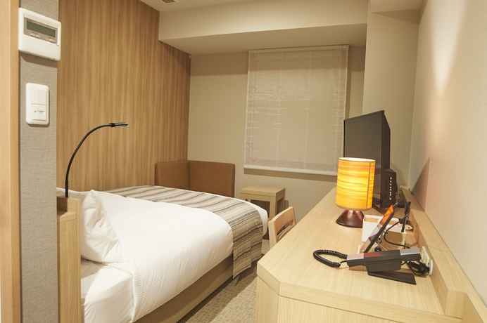 Imagen de la habitación del Hotel Quintessa Tokyo Haneda Comic & Books. Foto 16