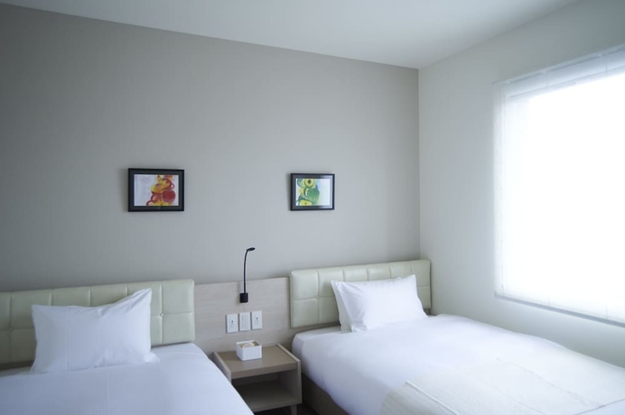 Imagen de la habitación del Hotel Quintessa Tokyo Haneda Comic & Books. Foto 17