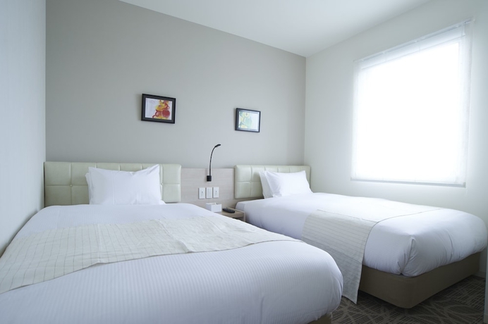 Imagen de la habitación del Hotel Quintessa Tokyo Haneda Comic & Books. Foto 18