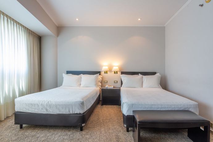 Imagen de la habitación del Hotel Quinto Centenario. Foto 5