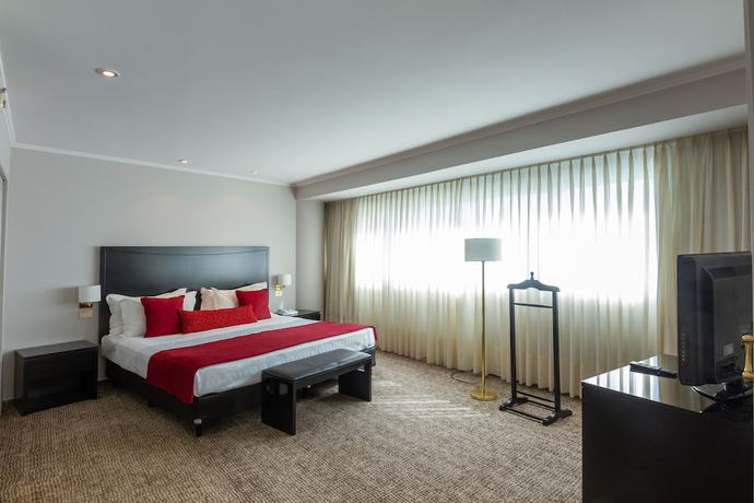 Imagen de la habitación del Hotel Quinto Centenario. Foto 6