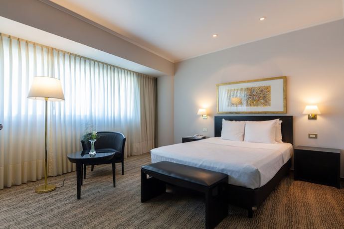 Imagen de la habitación del Hotel Quinto Centenario. Foto 9