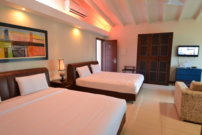 Imagen de la habitación del Hotel Quint's Travelers Inn. Foto 6