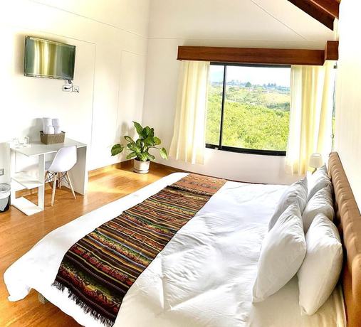 Imagen de la habitación del Hotel Quito Airport Suites. Foto 10