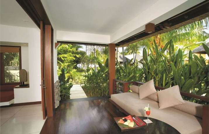 Imagen de la habitación del Hotel Qunci Villas. Foto 5