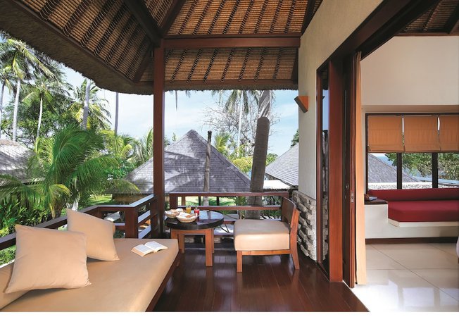 Imagen de la habitación del Hotel Qunci Villas. Foto 9