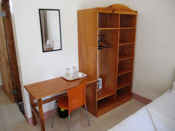 Imagen de la habitación del Hotel Quo Vadis Dive Resort Moalboal. Foto 10