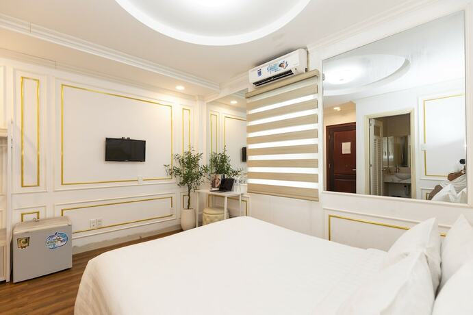 Imagen de la habitación del Hotel Quy Hung Hotel Central. Foto 14