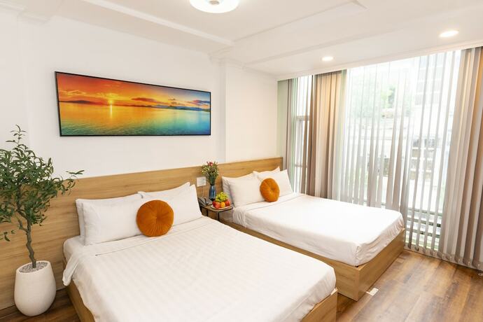 Imagen de la habitación del Hotel Quy Hung Hotel Central. Foto 16