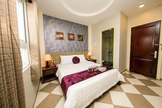 Imagen de la habitación del Hotel Quy Hung Hotel Central. Foto 17