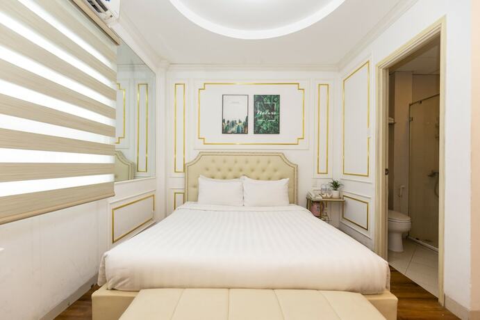Imagen de la habitación del Hotel Quy Hung Hotel Central. Foto 30