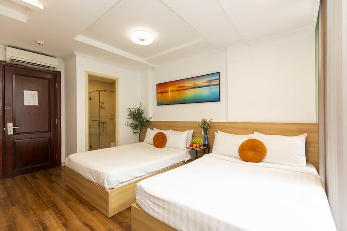 Imagen de la habitación del Hotel Quy Hung Hotel Central. Foto 33