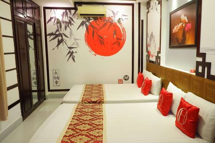 Imagen de la habitación del Hotel Quynh Huong. Foto 17