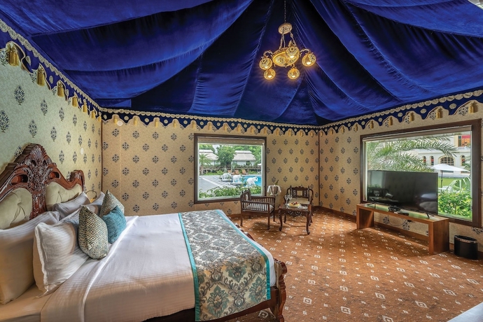 Imagen de la habitación del Hotel R Chandras Palace. Foto 5