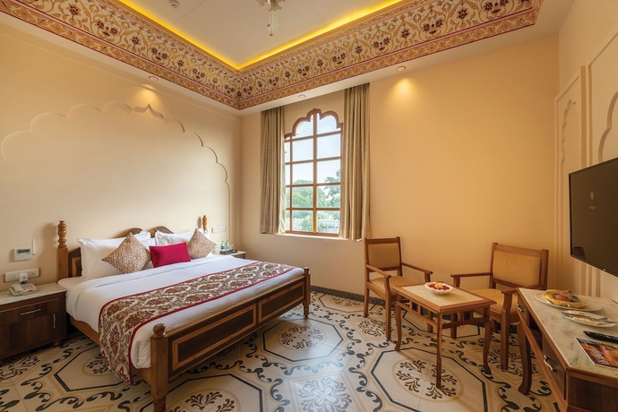 Imagen de la habitación del Hotel R Chandras Palace. Foto 6