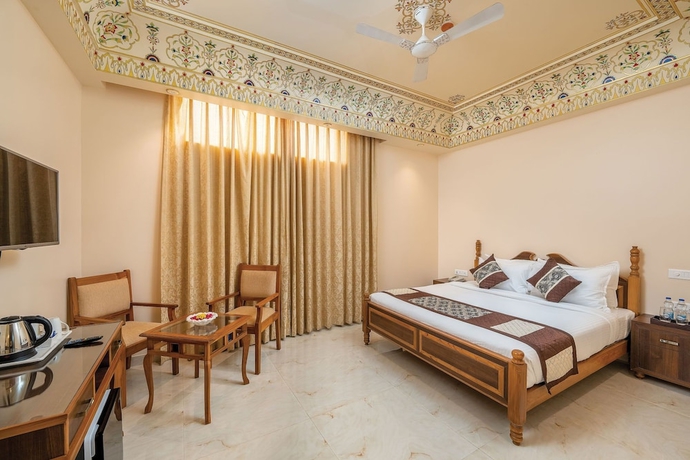 Imagen de la habitación del Hotel R Chandras Palace. Foto 8