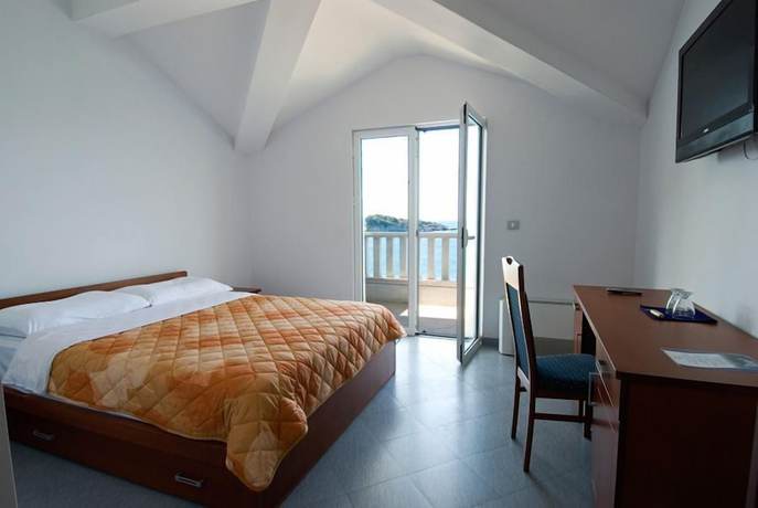 Imagen de la habitación del Hotel R. Foto 2