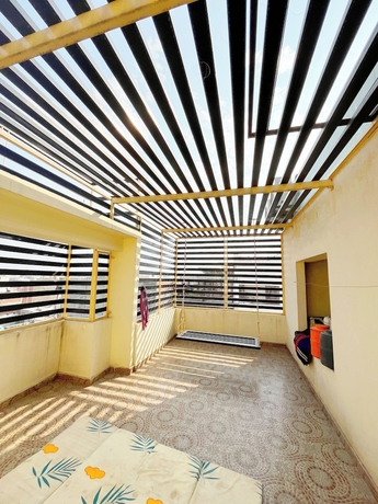 Imagen de la habitación del Hotel R K Guest House. Foto 8