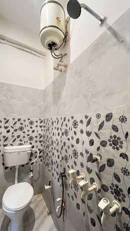 Imagen de la habitación del Hotel R K Lodge And Palace. Foto 15