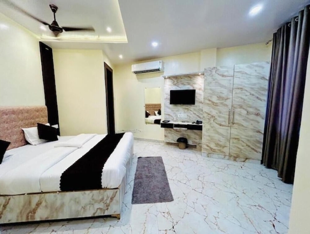 Imagen de la habitación del Hotel R K Palace, Varanasi. Foto 1