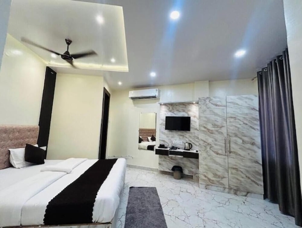 Imagen de la habitación del Hotel R K Palace, Varanasi. Foto 2