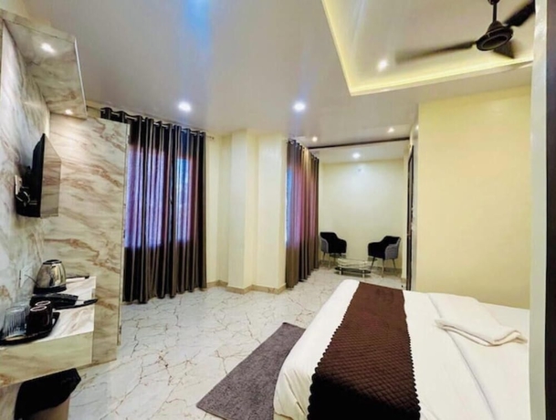 Imagen de la habitación del Hotel R K Palace, Varanasi. Foto 6