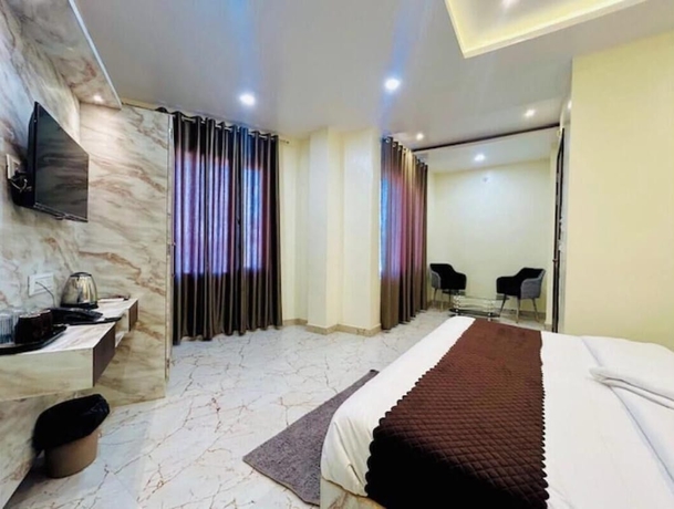Imagen de la habitación del Hotel R K Palace, Varanasi. Foto 7