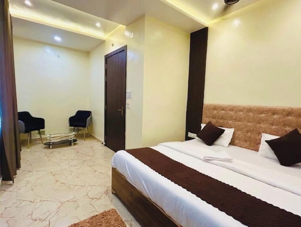 Imagen de la habitación del Hotel R K Palace, Varanasi. Foto 9