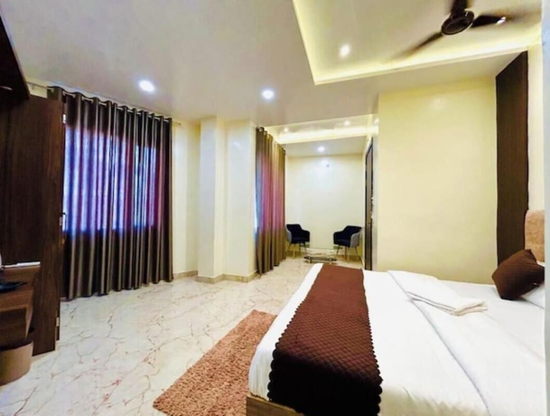 Imagen de la habitación del Hotel R K Palace, Varanasi. Foto 10