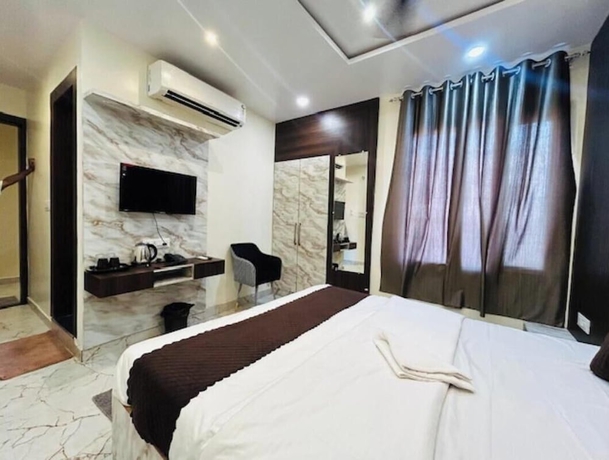 Imagen de la habitación del Hotel R K Palace, Varanasi. Foto 14