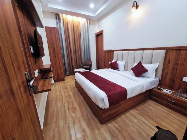 Imagen de la habitación del Hotel R K Residency Near Bihariji Mandir. Foto 10