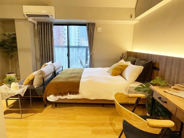 Imagen de la habitación del Hotel R Namba. Foto 14