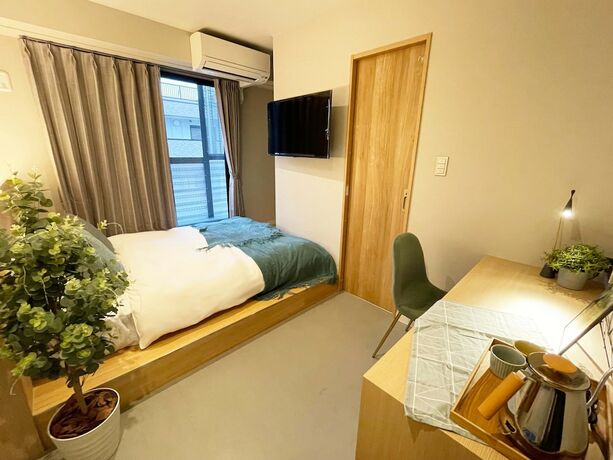 Imagen de la habitación del Hotel R Namba. Foto 15