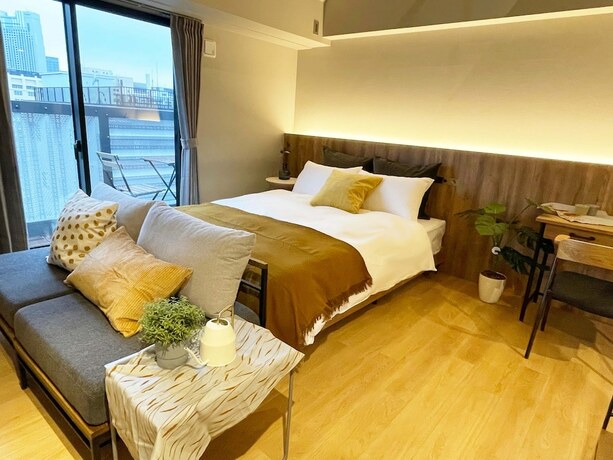 Imagen de la habitación del Hotel R Namba. Foto 17