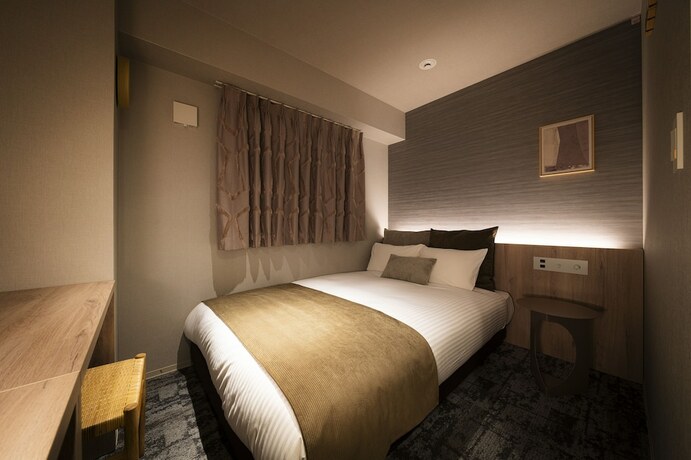 Imagen de la habitación del Hotel R Namba South. Foto 14