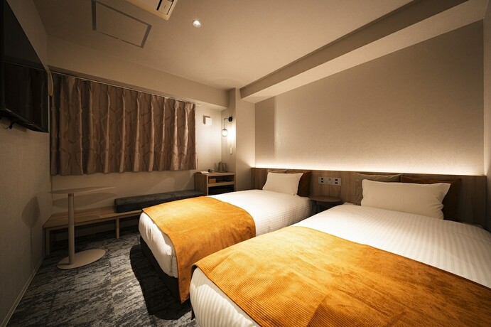 Imagen de la habitación del Hotel R Namba South. Foto 18