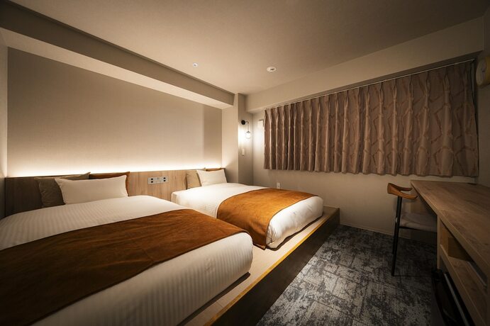 Imagen de la habitación del Hotel R Namba South. Foto 19