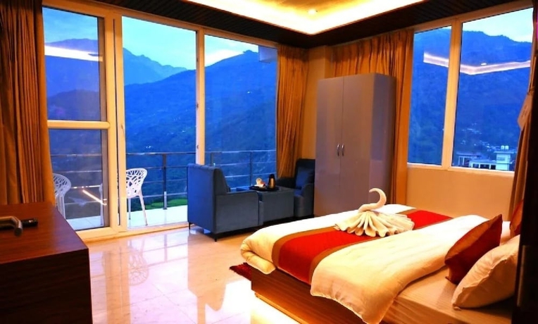 Imagen de la habitación del Hotel R Narayan Pleasant Inn - Guptkashi. Foto 5