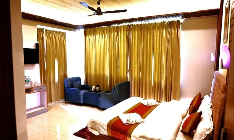 Imagen de la habitación del Hotel R Narayan Pleasant Inn - Guptkashi. Foto 7
