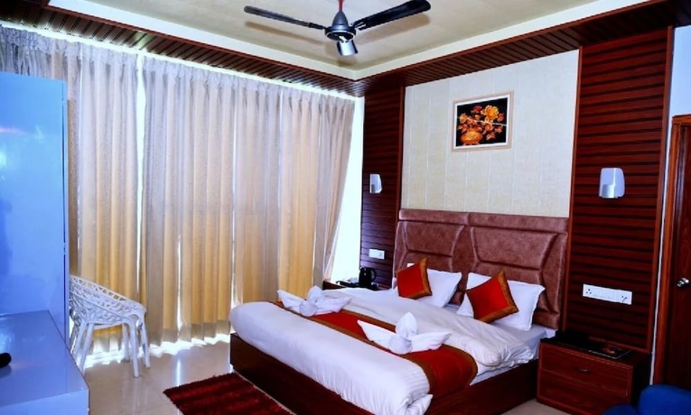 Imagen de la habitación del Hotel R Narayan Pleasant Inn - Guptkashi. Foto 8