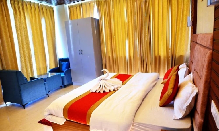 Imagen de la habitación del Hotel R Narayan Pleasant Inn - Guptkashi. Foto 9