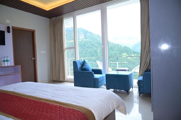 Imagen de la habitación del Hotel R Narayan Pleasant Inn - Guptkashi. Foto 11