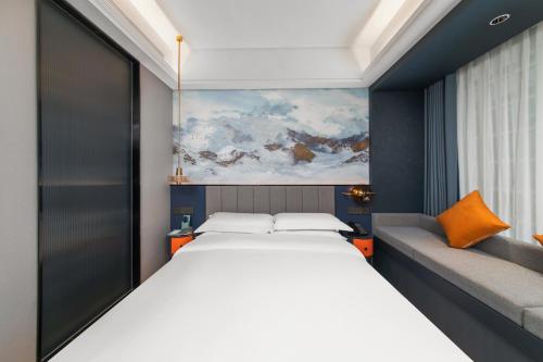 Imagen de la habitación del Hotel R ROYALSS HOTE Qujiang Dayan Pagoda. Foto 14