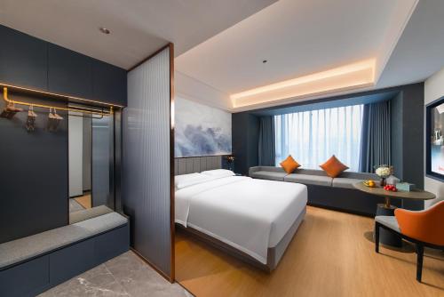 Imagen de la habitación del Hotel R ROYALSS HOTE Qujiang Dayan Pagoda. Foto 15