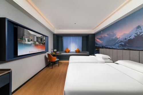 Imagen de la habitación del Hotel R ROYALSS HOTE Qujiang Dayan Pagoda. Foto 16