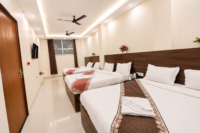 Imagen de la habitación del Hotel R Raghavam. Foto 4
