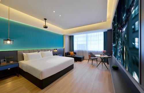 Imagen de la habitación del Hotel R Royalss, Yulin Yuxing Square. Foto 16