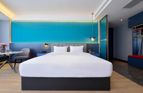 Imagen de la habitación del Hotel R Royalss, Yulin Yuxing Square. Foto 17