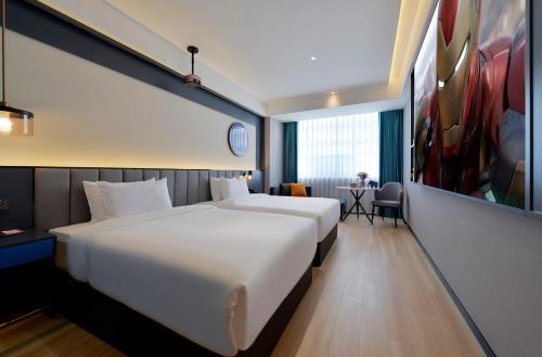 Imagen de la habitación del Hotel R Royalss, Yulin Yuxing Square. Foto 19
