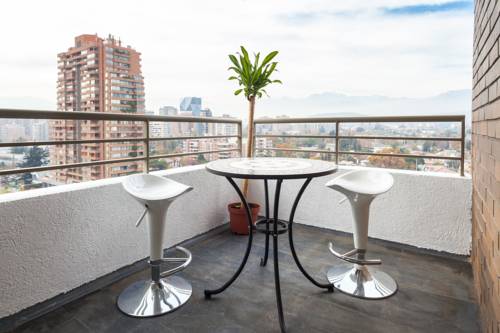 Imagen de la habitación del Hotel RA1 Apartamento Metro Manquehue. Foto 6